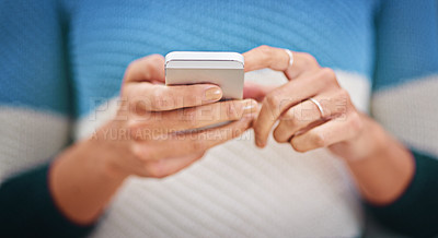 Buy stock photo Cropped shot of a woman using a mobile phone