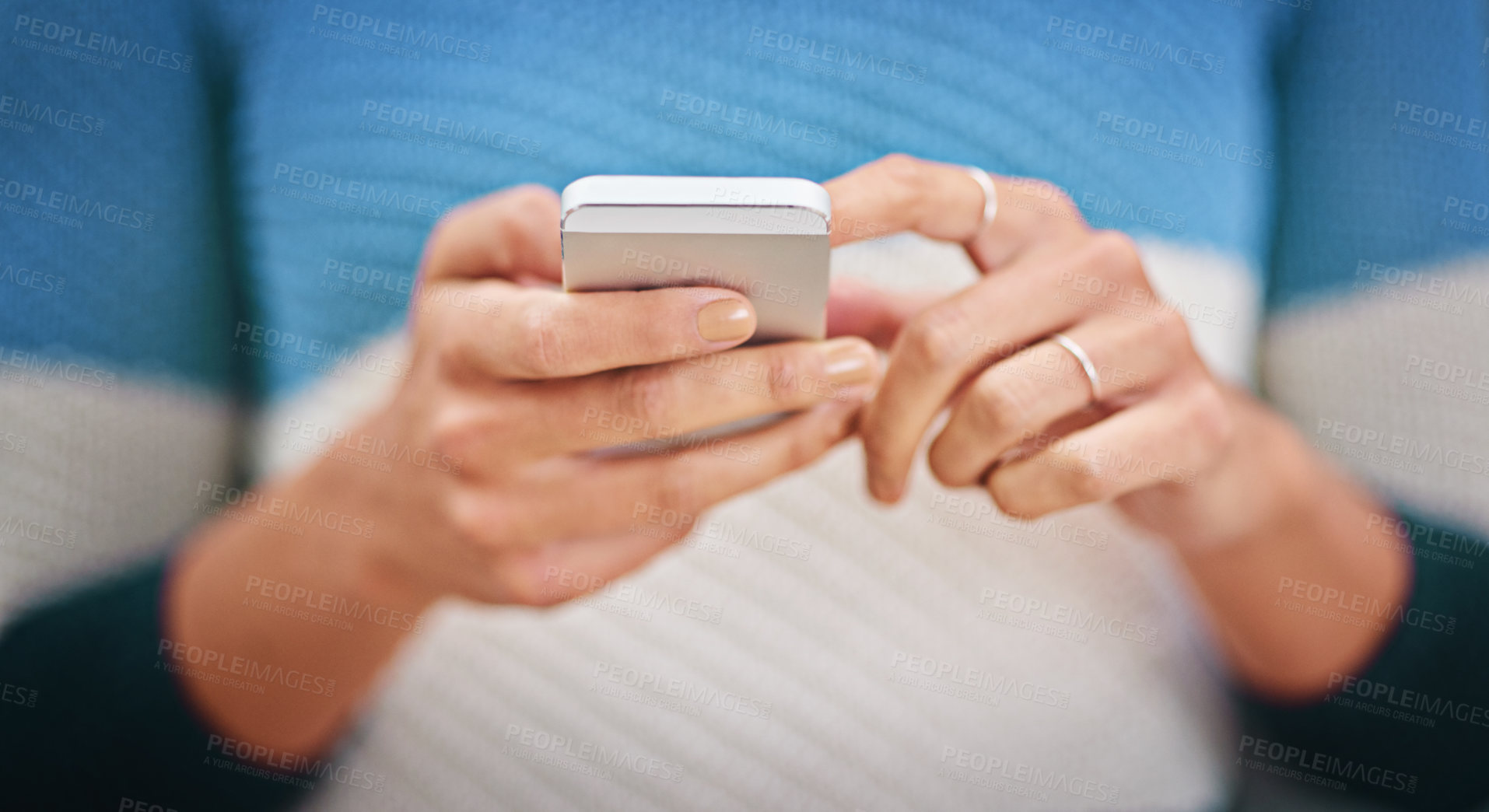 Buy stock photo Cropped shot of a woman using a mobile phone