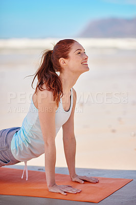 Buy stock photo Pilates, beach and woman on mat for fitness, mindfulness and balance with health exercise. Wellness, relax and female person with yoga workout for flexibility, zen and calm by ocean in morning.