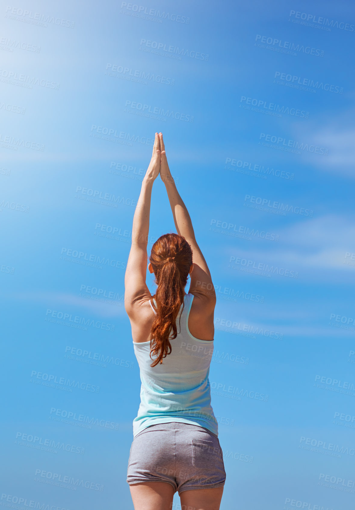 Buy stock photo Woman, exercise and yoga for meditation with hands in air against blue sky for freedom, health and wellness outdoor. Fitness model in prayer pose for workout, mindfulness and mental health meditation