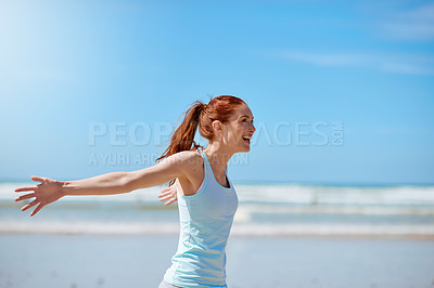 Buy stock photo Woman, beach and smile with open arms for freedom to relax, break and mental health. Female person, stress relief and happy with yoga or balance for wellness, wellbeing and self care in ocean