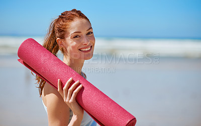 Buy stock photo Woman, beach and happy with yoga mat on portrait to relax, break and mental health. Female person, stress relief and smile with exercise or workout for wellness, wellbeing and self care in Spain