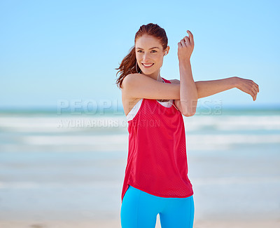 Buy stock photo Stretching, running and music with woman at beach for cardio, jogging and fitness endurance. Goal, training and stamina with warm up runner listening with earphones on shoreline for energy and sports