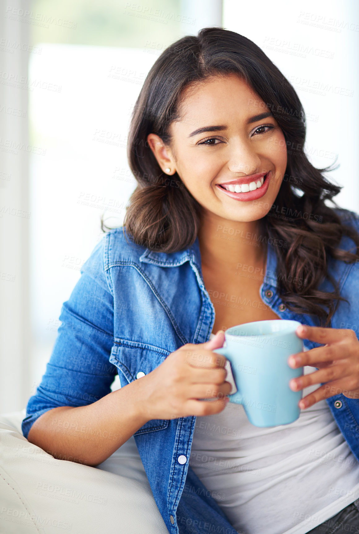 Buy stock photo Woman, portrait and smile with tea in living room on sofa for relax with weekend in home. Happy, apartment and drink with coffee mug or hot cocoa in morning with warm beverage, couch and positive