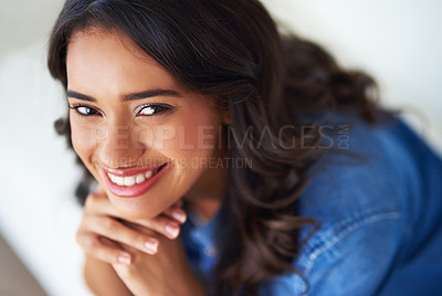 Buy stock photo Woman, face and happy to relax portrait on sofa in home for happiness or relaxing lifestyle. Young person, smile and mental health wellbeing or smiling for couch relaxation or positive thinking