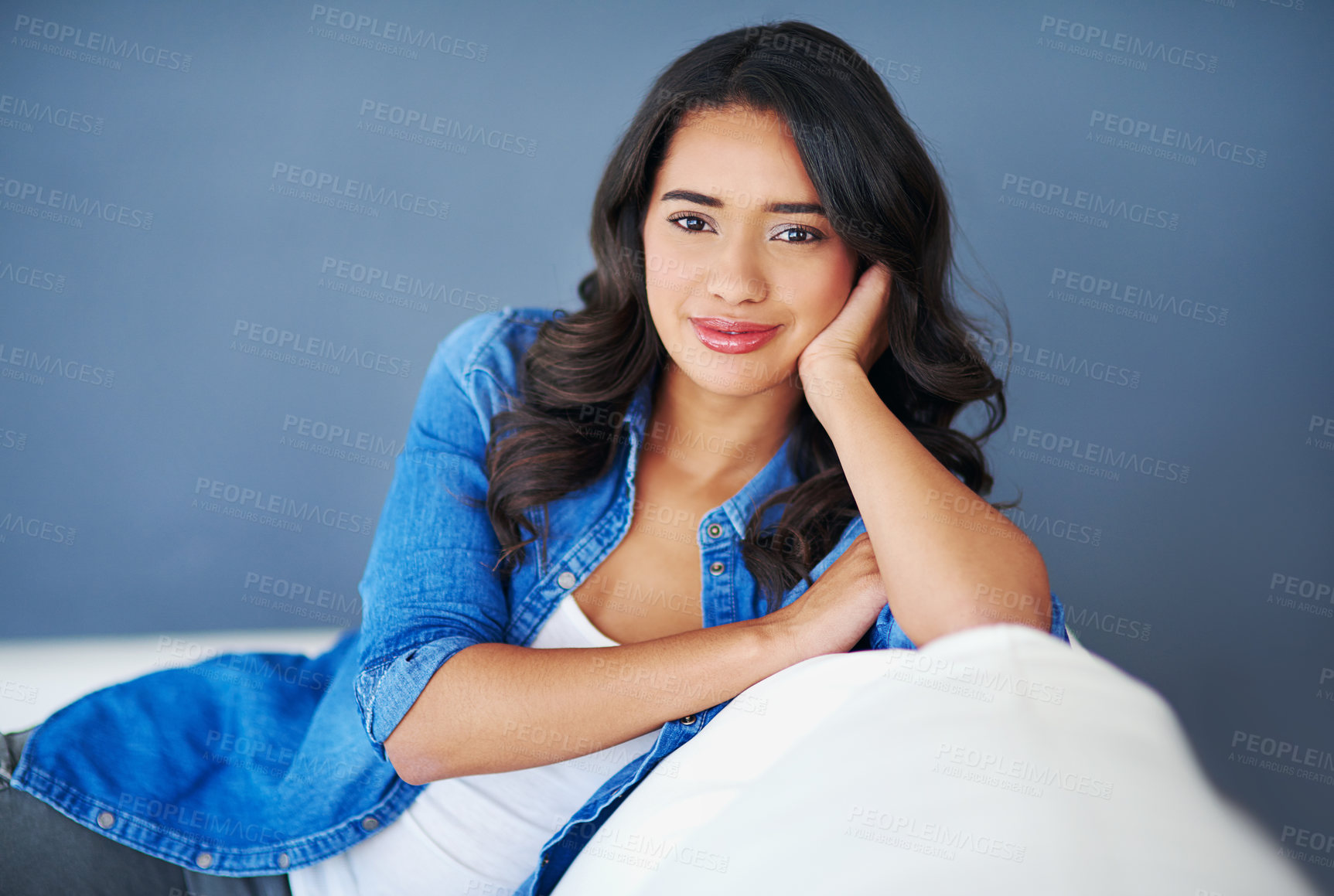 Buy stock photo Portrait, relax and woman with comfort, home and resting with confidence, weekend break and calm in lounge. Face, person on couch and girl in living room, happiness and chilling with positive smile