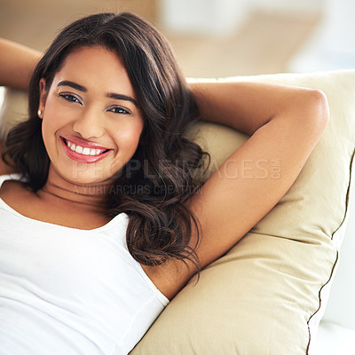 Buy stock photo Relax, smile and portrait of woman on sofa for happy, luxury and lifestyle. Comfortable, happy and content with girl lying on couch in living room at home for lounge, break and rest on weekend
