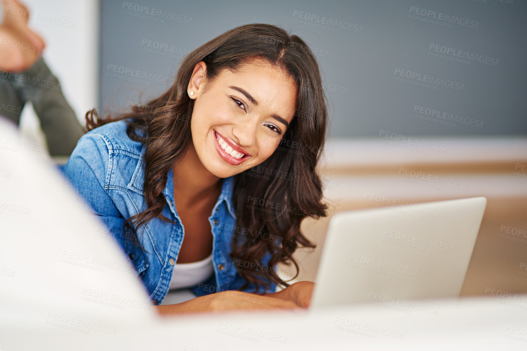 Buy stock photo Laptop, woman and portrait, living room and relax on sofa, work from home and internet search, technology and social media. Freelancer, blogger and happy female typing on computer in apartment lounge