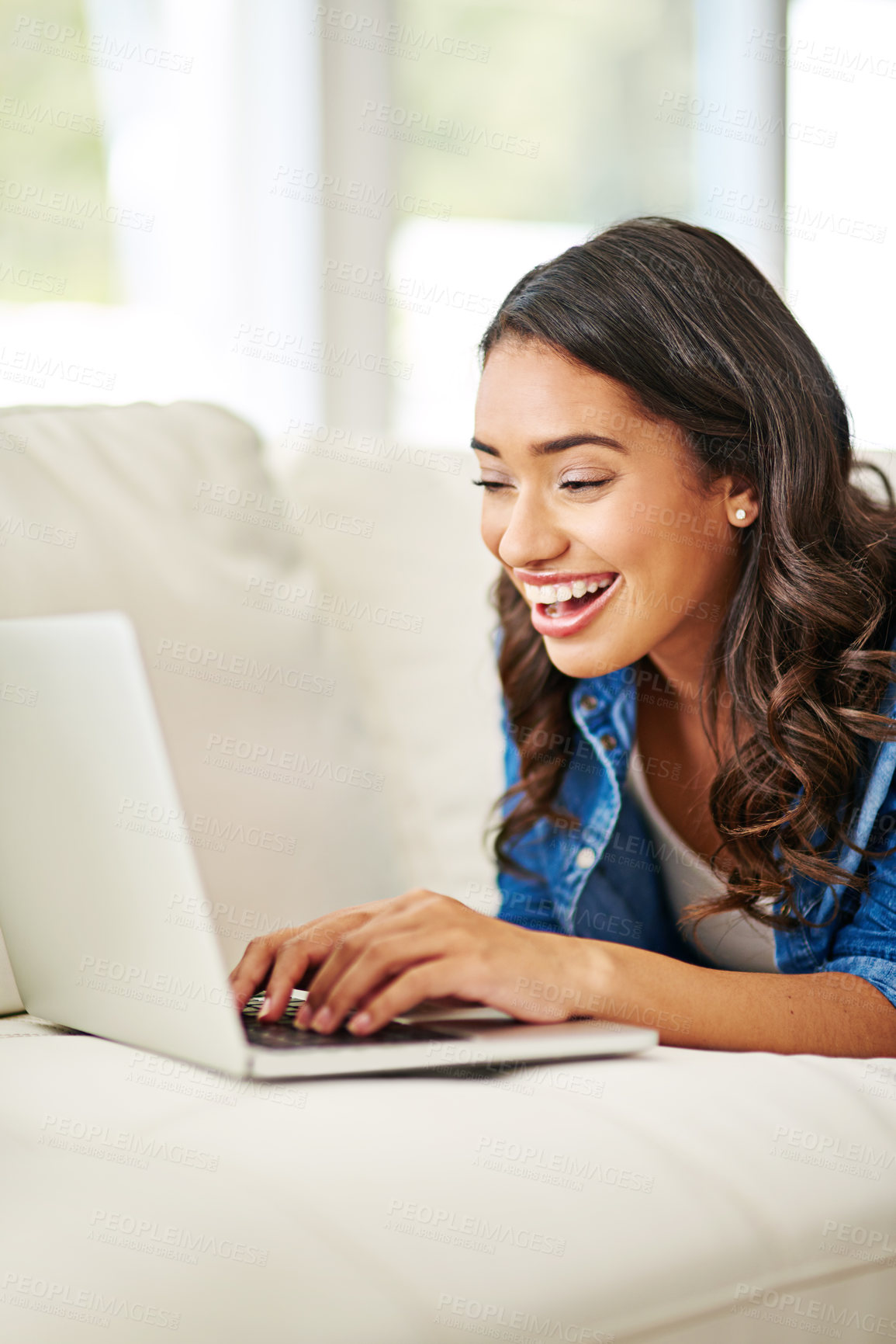 Buy stock photo Woman, laptop and smile for good news on sofa reading email, blog or relaxing in social media at home. Happy excited female in online conversation, sale or computer connection on living room couch