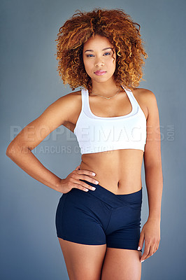 Buy stock photo Fitness, exercise and portrait of a woman in a studio for health, wellness and balance in sportswear. Sports, workout and girl model from Brazil with an afro posing while isolated by gray background.