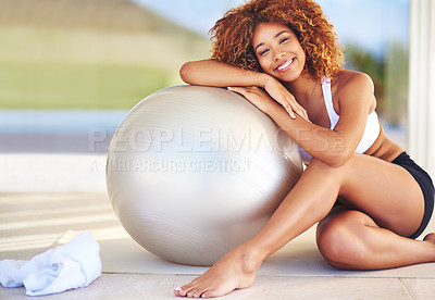 Buy stock photo Girl, happy and confident in home with medicine ball for exercise, workout and satisfied with progress. Female person, break and smile or portrait with fitness for health, wellbeing and wellness