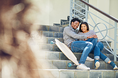 Buy stock photo Couple, happy and skateboard while sitting on stairs with hug, love and romance in city sunshine. Black couple, urban happiness and outdoor with skater, embrace and romance on steps in San Francisco