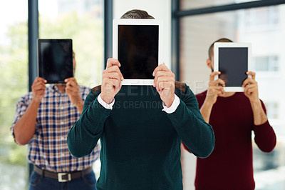 Buy stock photo Business, people and hiding with tablet in office for creative disguise, technology privacy and anonymous. Group, digital screen and mockup space for identity security, online safety and confidential