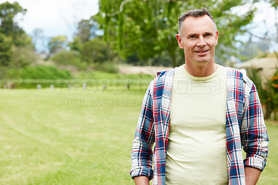 Buy stock photo Portrait of a mature man standing outside