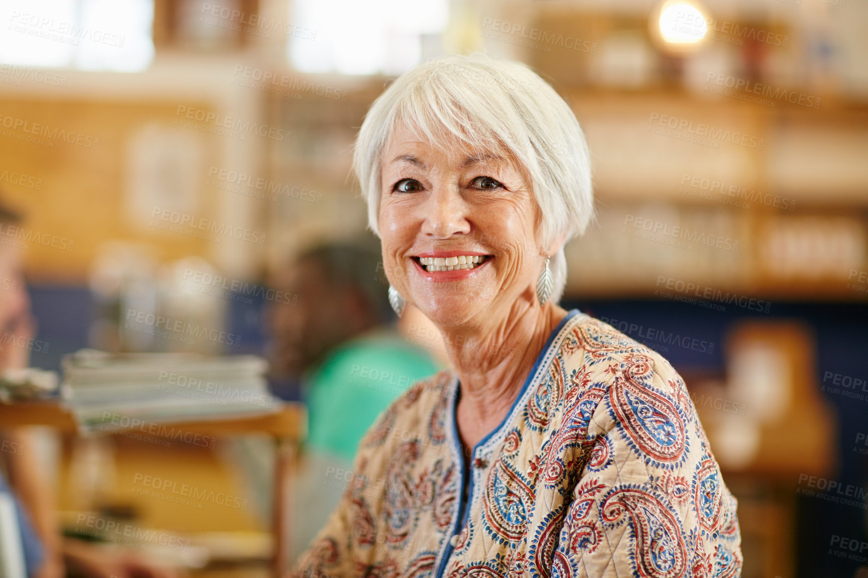 Buy stock photo Portrait of a smiling senior woman in a cafe