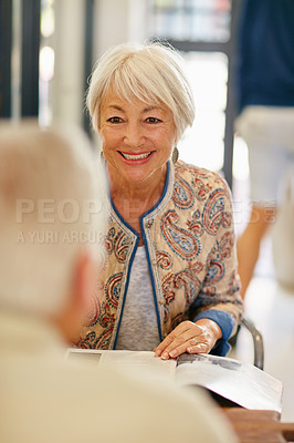 Buy stock photo Shot of a smiling senior couple taking together in a cafe