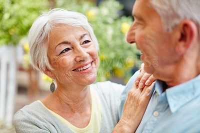 Buy stock photo Shot of a happy senior couple outdoors