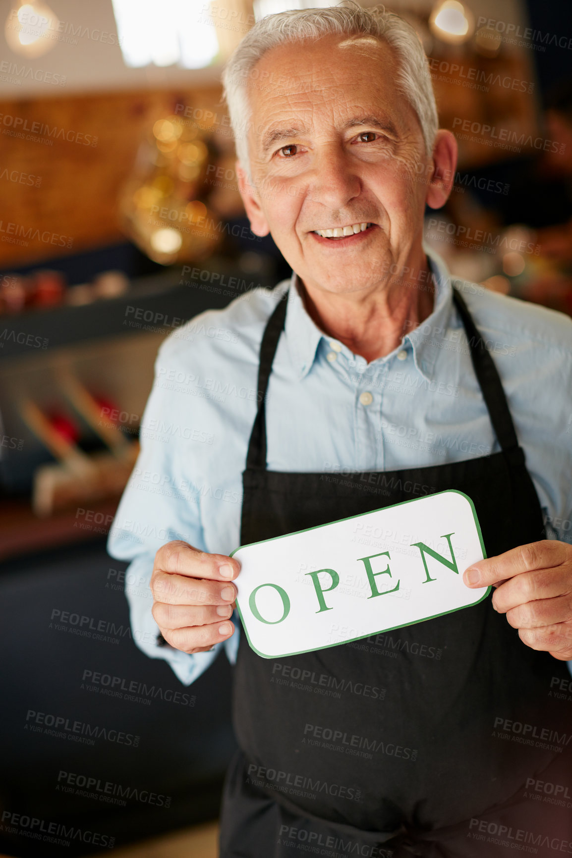 Buy stock photo Portrait of a senior man holding up a sign on opening day of his small business