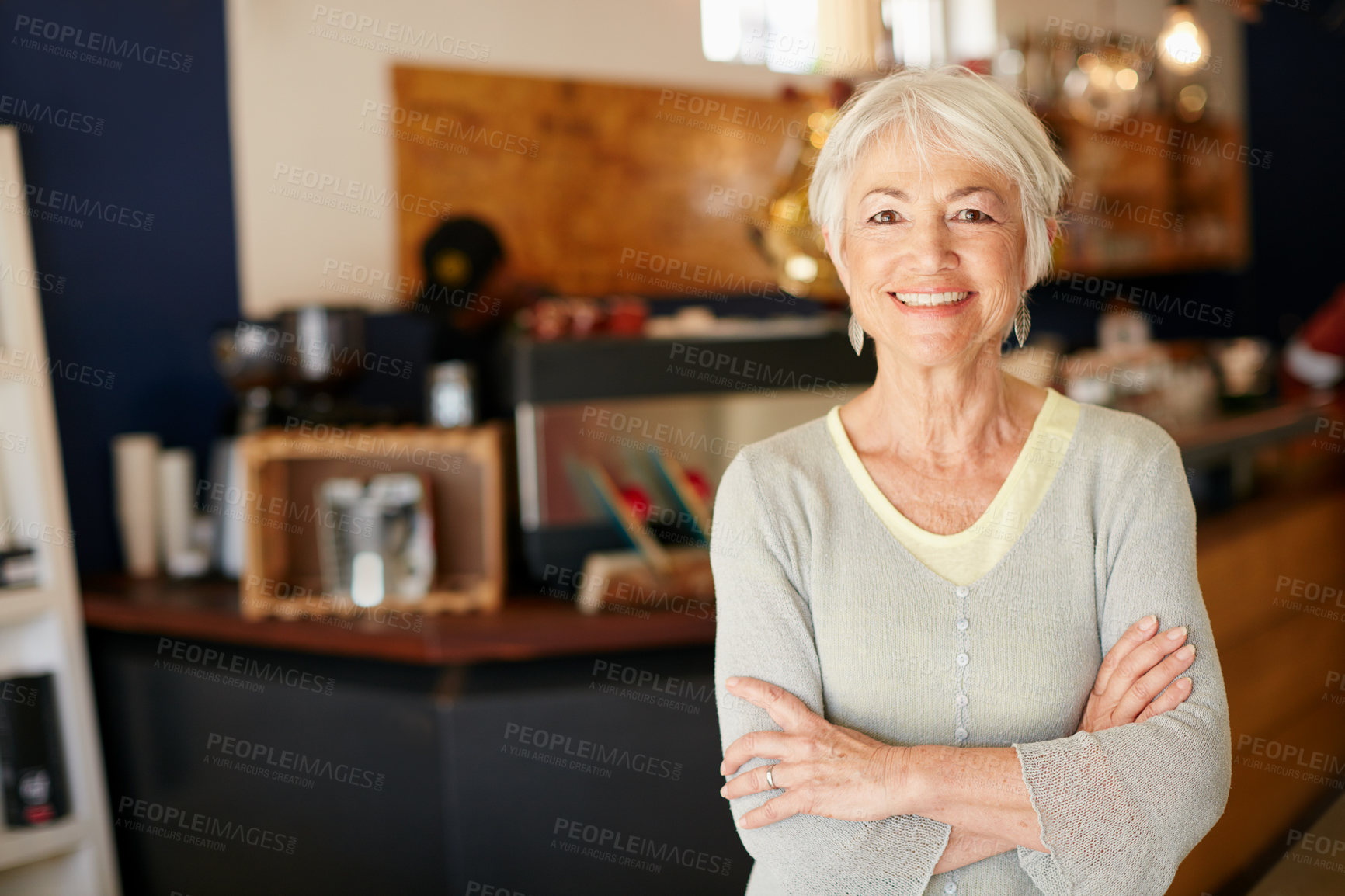 Buy stock photo Elderly, woman and portrait with crossed arms work in coffee shop for retirement for a small business. Senior female, professional and cafe for investment is working in a store for with a smile.