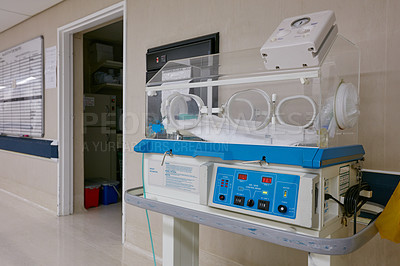 Buy stock photo Shot of an empty incubator in the neonatal unit of a hospital