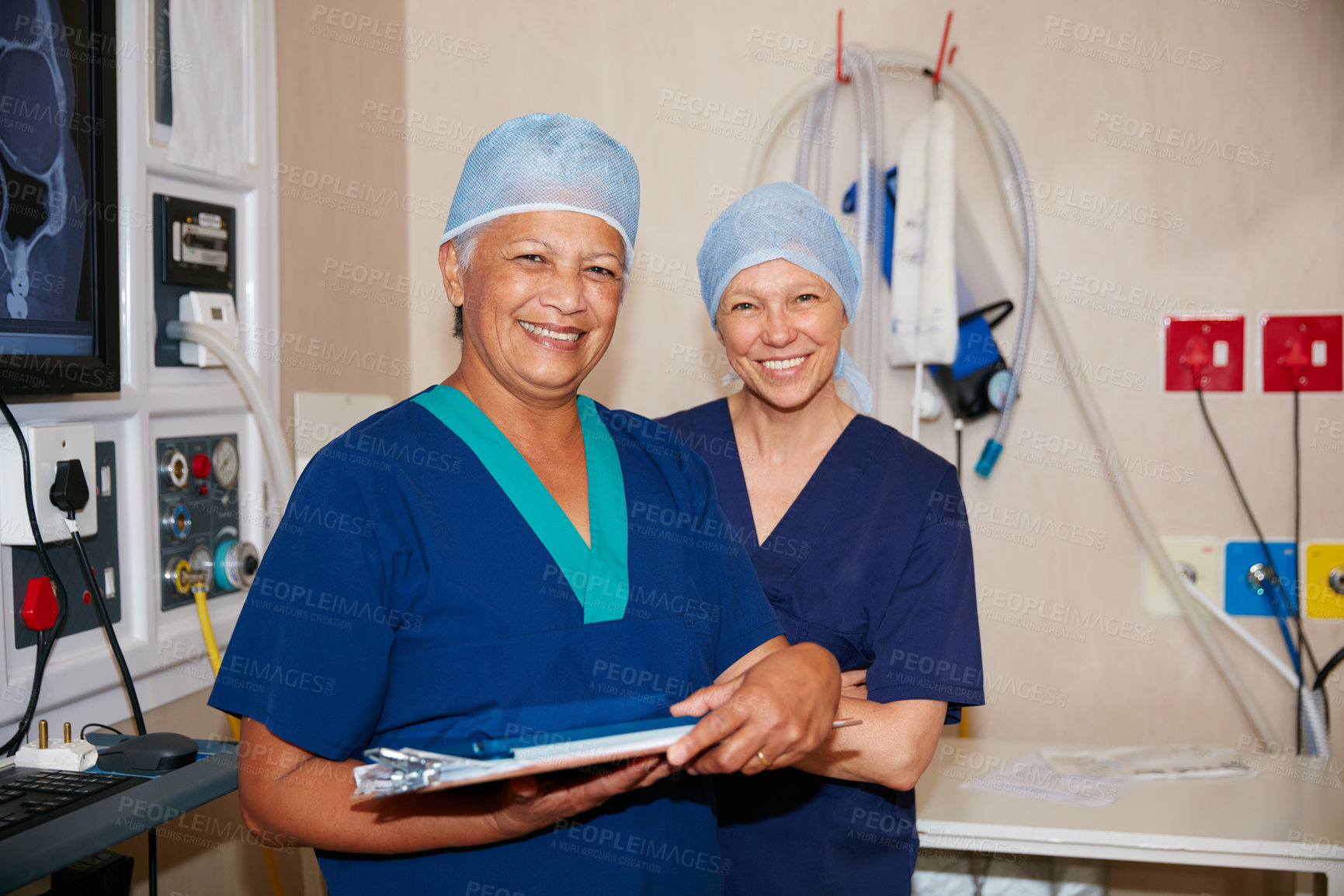 Buy stock photo Portrait of two surgeons working in a hospital