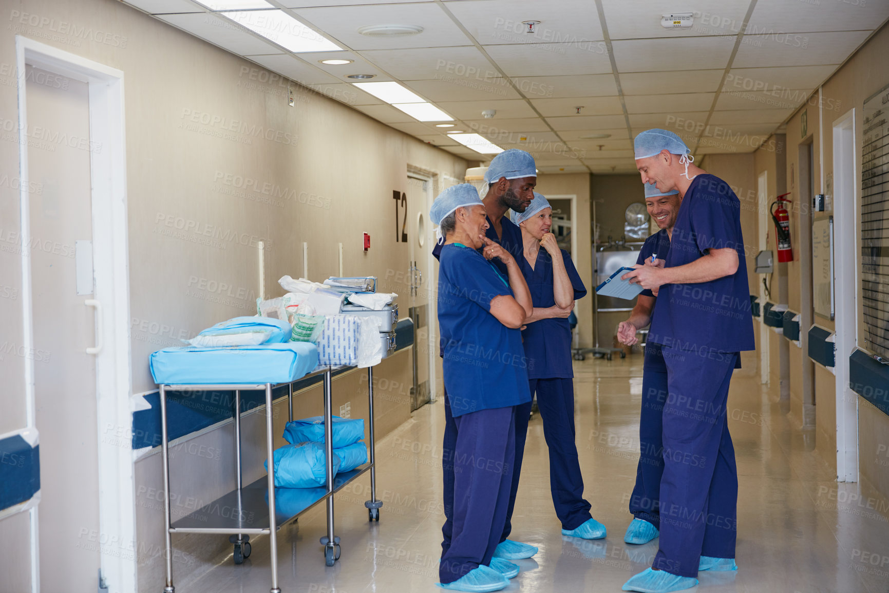 Buy stock photo Full length shot of a medical team standing in a hospital