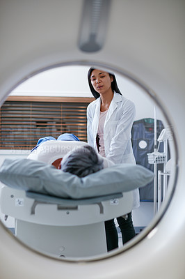 Buy stock photo Mri, doctor and woman comfort patient in hospital before scanning in machine. Ct scan, comforting and medical professional with senior female person before radiology test for healthcare in clinic.