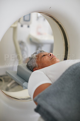 Buy stock photo Shot of a senior woman about to have an MRI scan