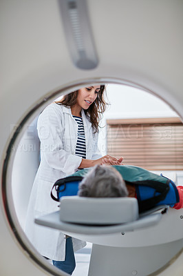 Buy stock photo Doctor, mri and woman comfort patient in hospital before scanning in machine. Ct scan, holding hands and medical professional with senior female person in radiology test for healthcare in clinic.