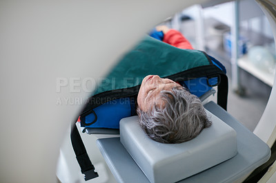Buy stock photo Shot of a mature woman about to have an MRI scan