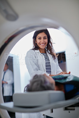 Buy stock photo Doctor, mri and portrait of woman with patient to comfort in hospital for machine scanning. Ct scan, holding hands or smile of medical professional with senior person in radiology test for healthcare