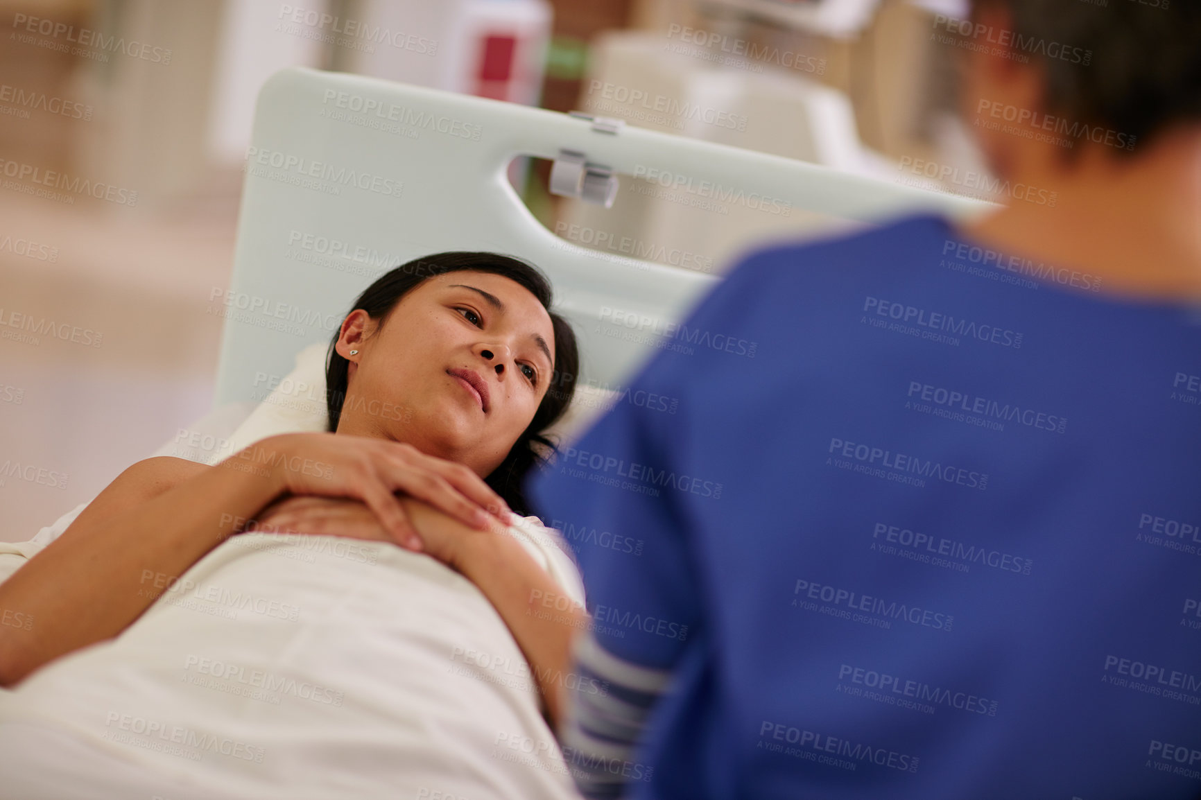 Buy stock photo Cropped shot of a patient talking to her nurse