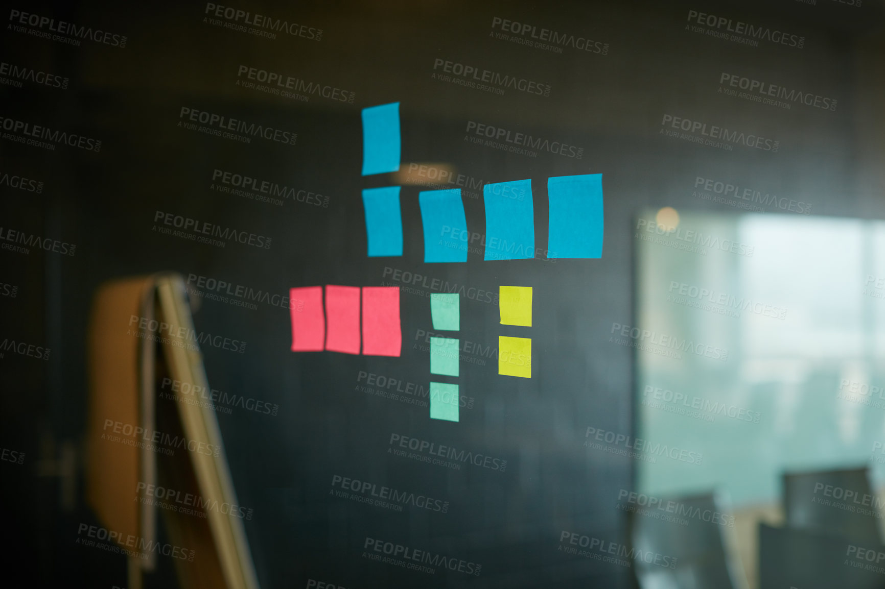 Buy stock photo Shot of a bunch sticky notes on a glass wall