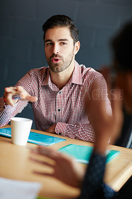 Buy stock photo Shot of a businessman in a meeting