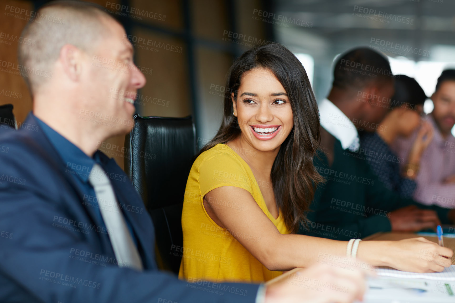 Buy stock photo Shot of a group of colleagues having a meeting in a boardroom