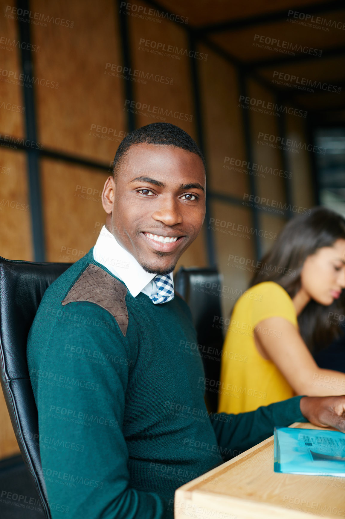 Buy stock photo Portrait of an office worker in a meeting with colleagues in the background