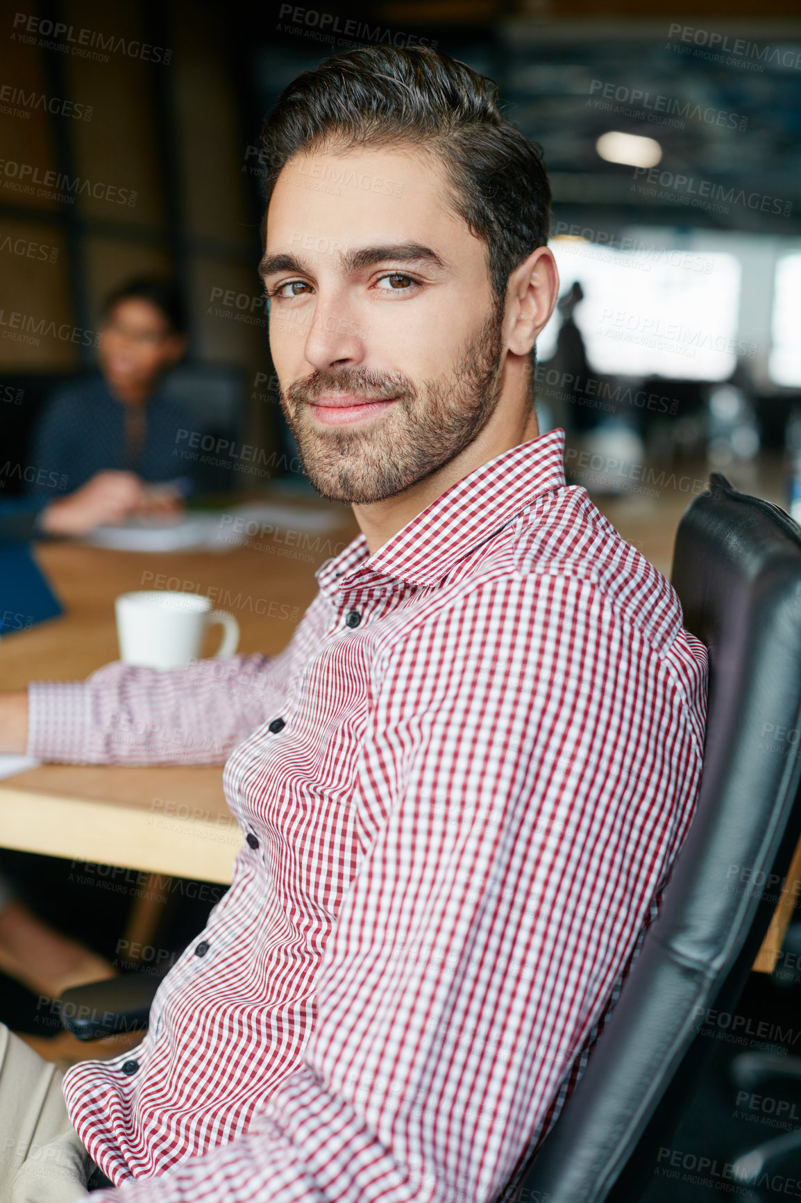 Buy stock photo Portrait of an office worker in a meeting with colleagues in the background