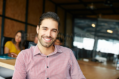 Buy stock photo Portrait of an office worker in a meeting with colleagues in the background