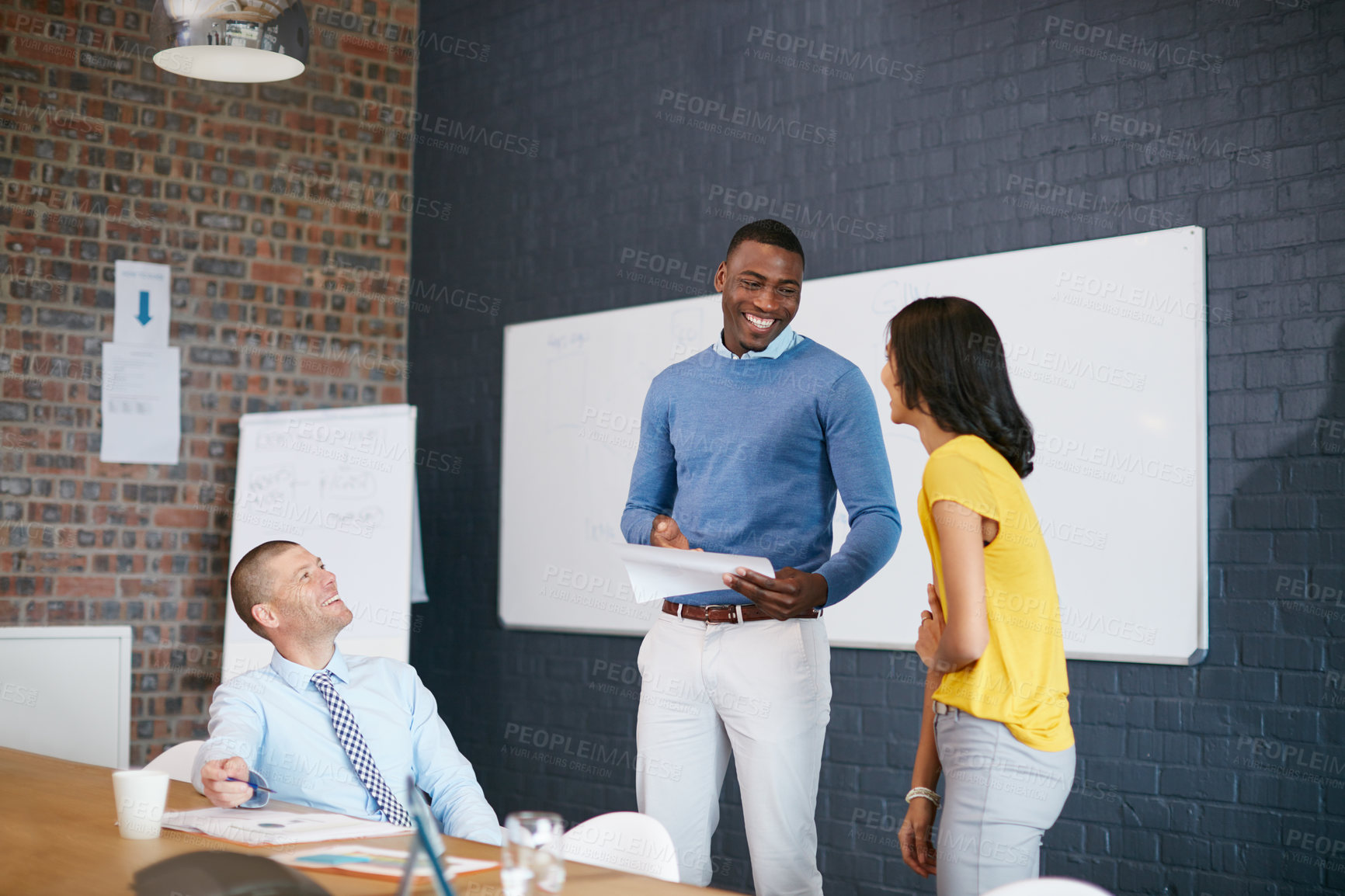 Buy stock photo Cropped shot of three businesspeople in the office