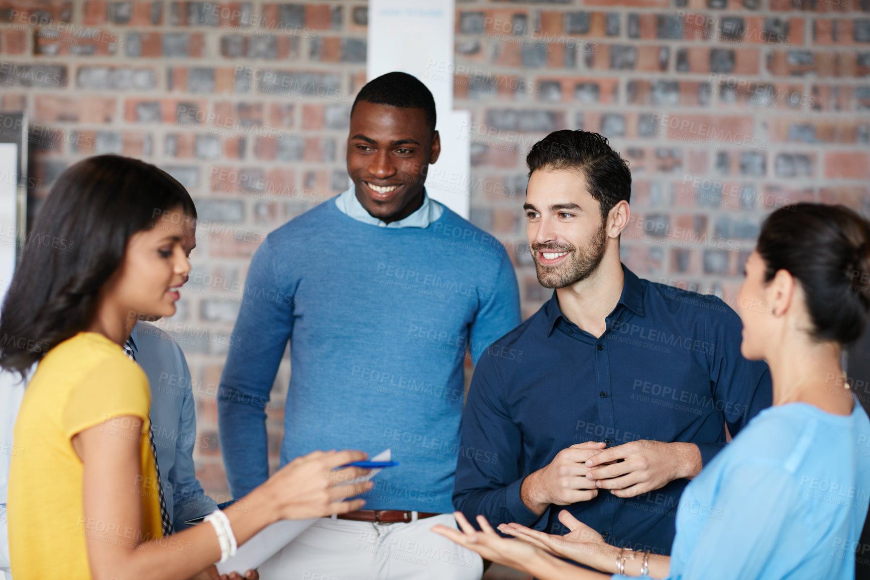 Buy stock photo Cropped shot of a group of businesspeople in the boardroom