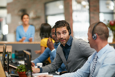 Buy stock photo Cropped shot of a group of creative professionals working in the office