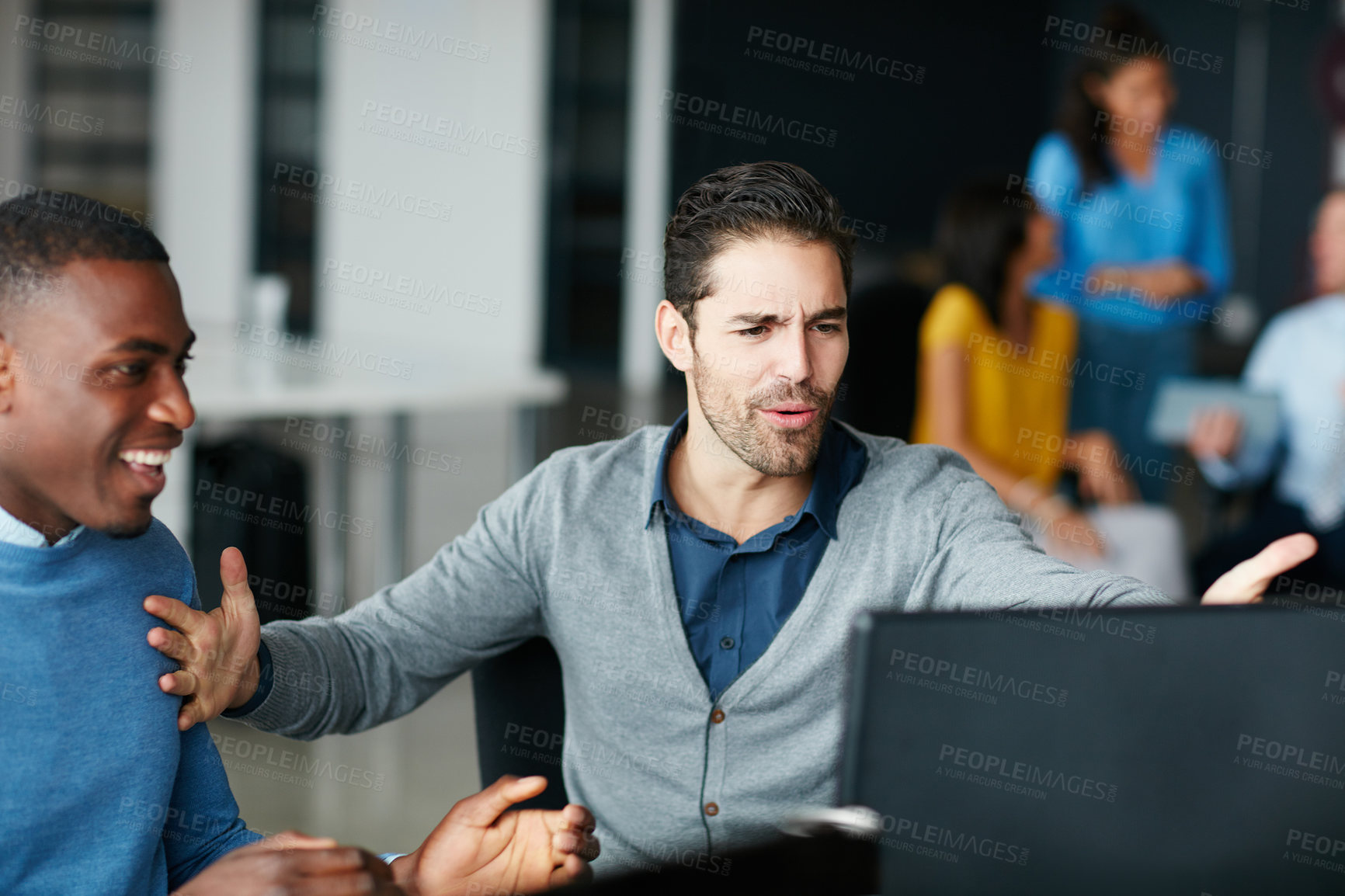 Buy stock photo Cropped shot of two businessmen cheering in the office