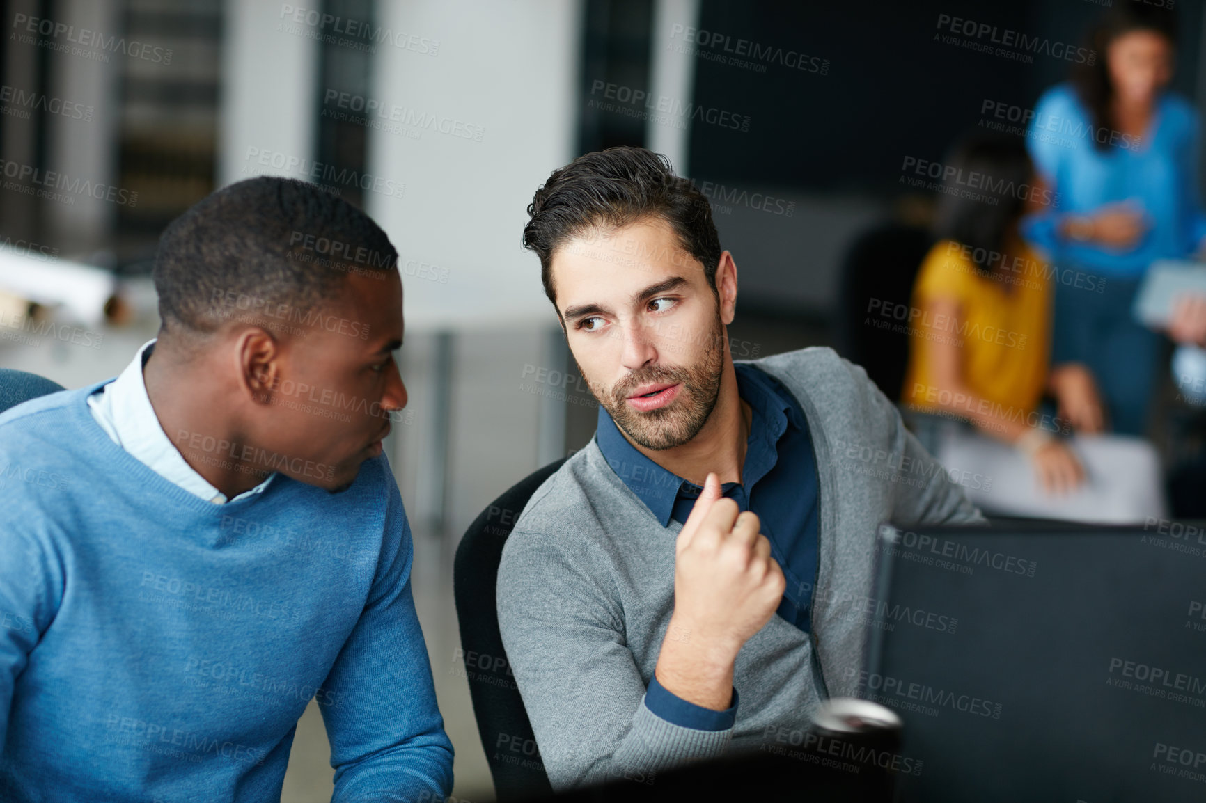 Buy stock photo Cropped shot of two businessmen working in the office