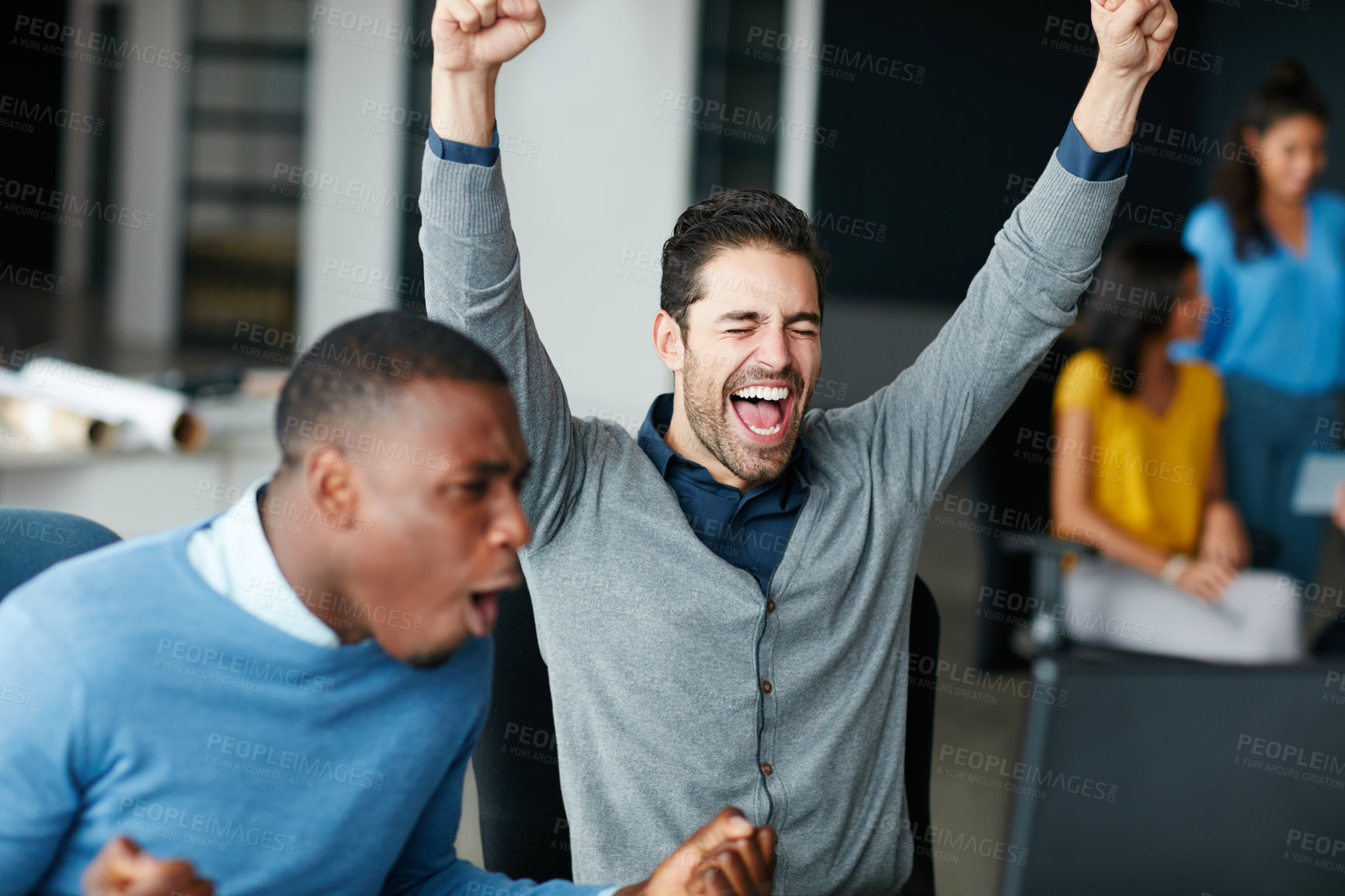 Buy stock photo Cropped shot of two businessmen cheering in the office