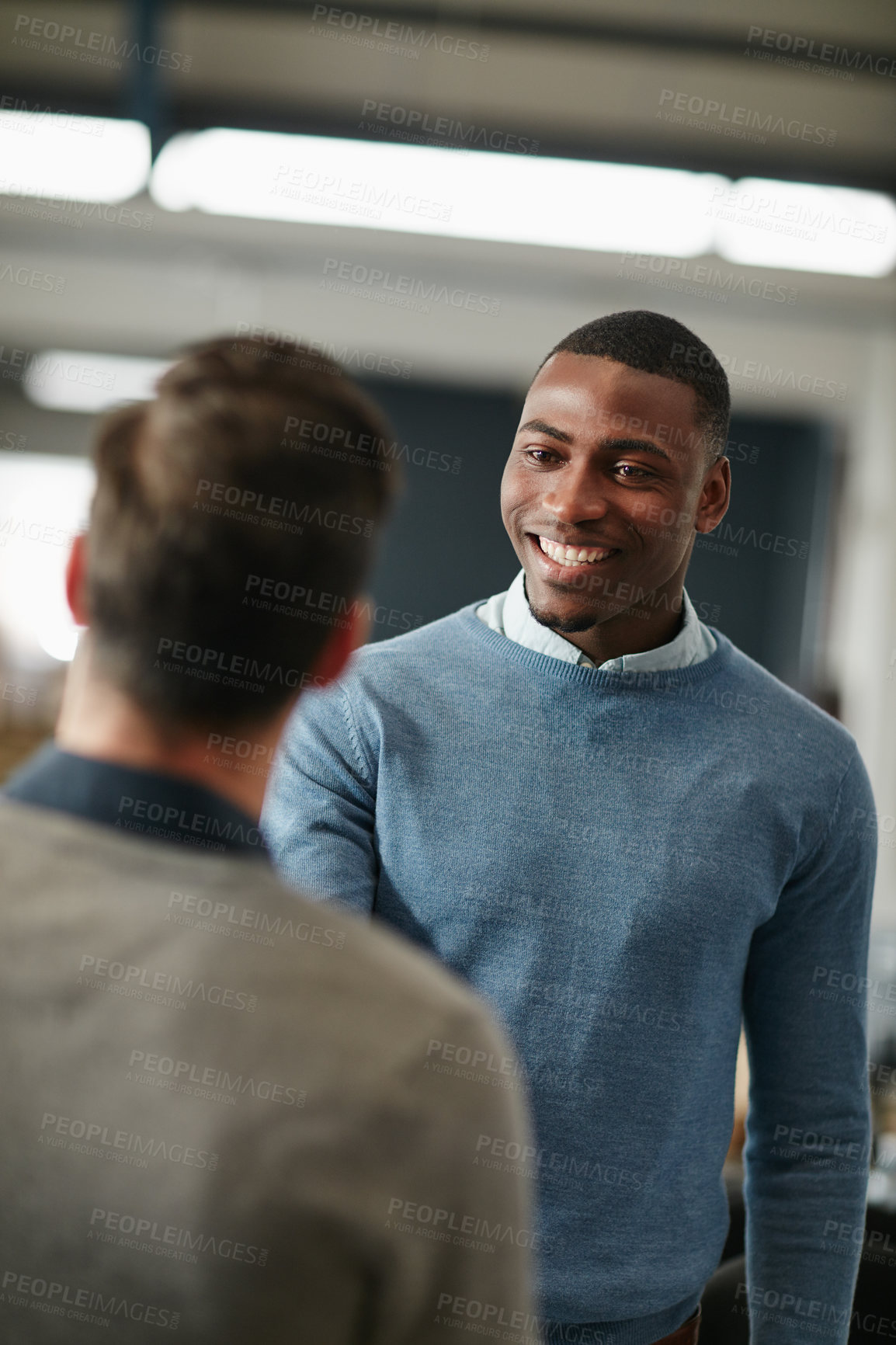 Buy stock photo Cropped shot of two businessmen shaking hands