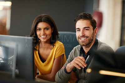 Buy stock photo Cropped portrait of two businesspeople working in the office