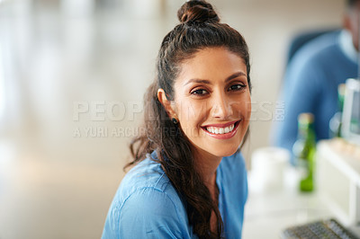 Buy stock photo Cropped portrait of a young businesswoman sitting in the office