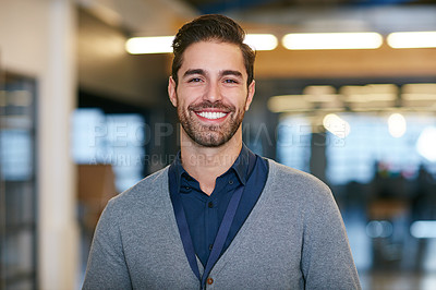 Buy stock photo Cropped portrait of a young man standing in the office