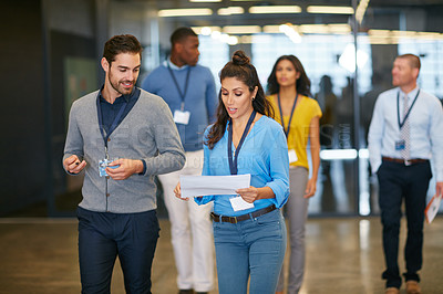 Buy stock photo Cropped shot of a group of businesspeople walking into work