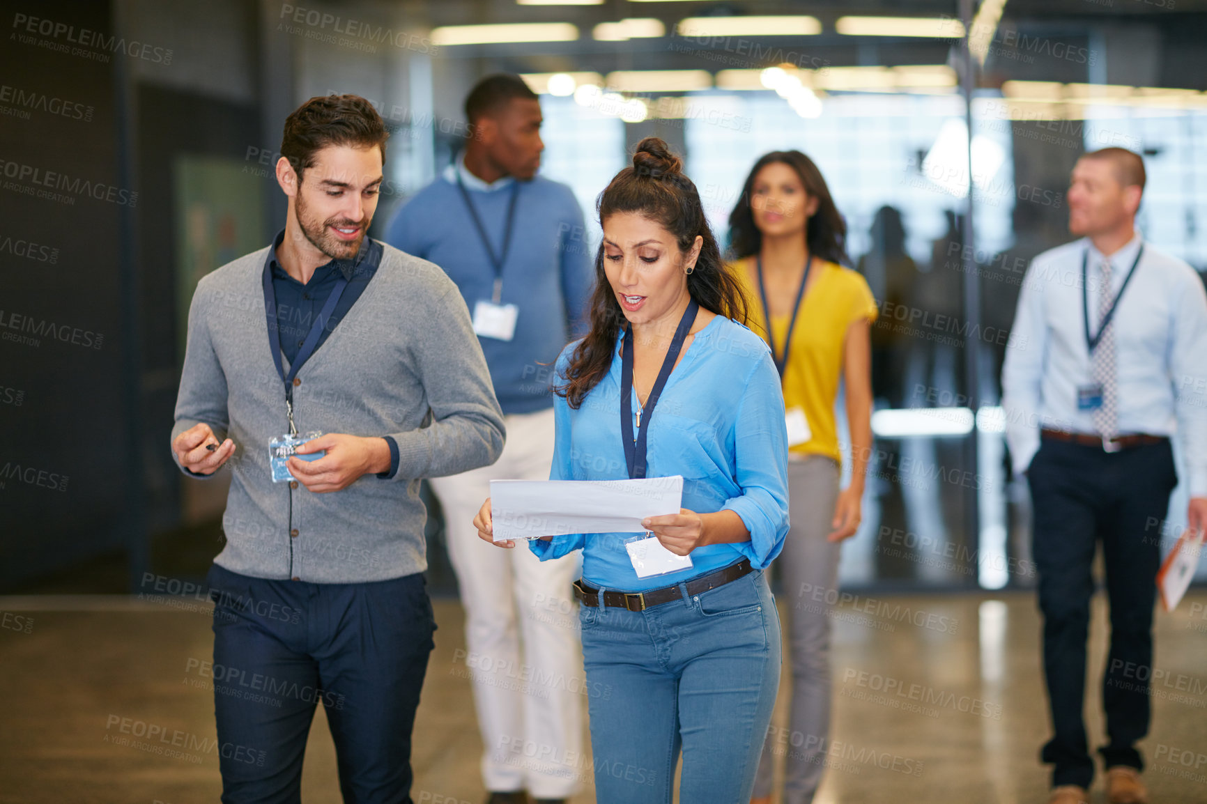 Buy stock photo Cropped shot of a group of businesspeople walking into work